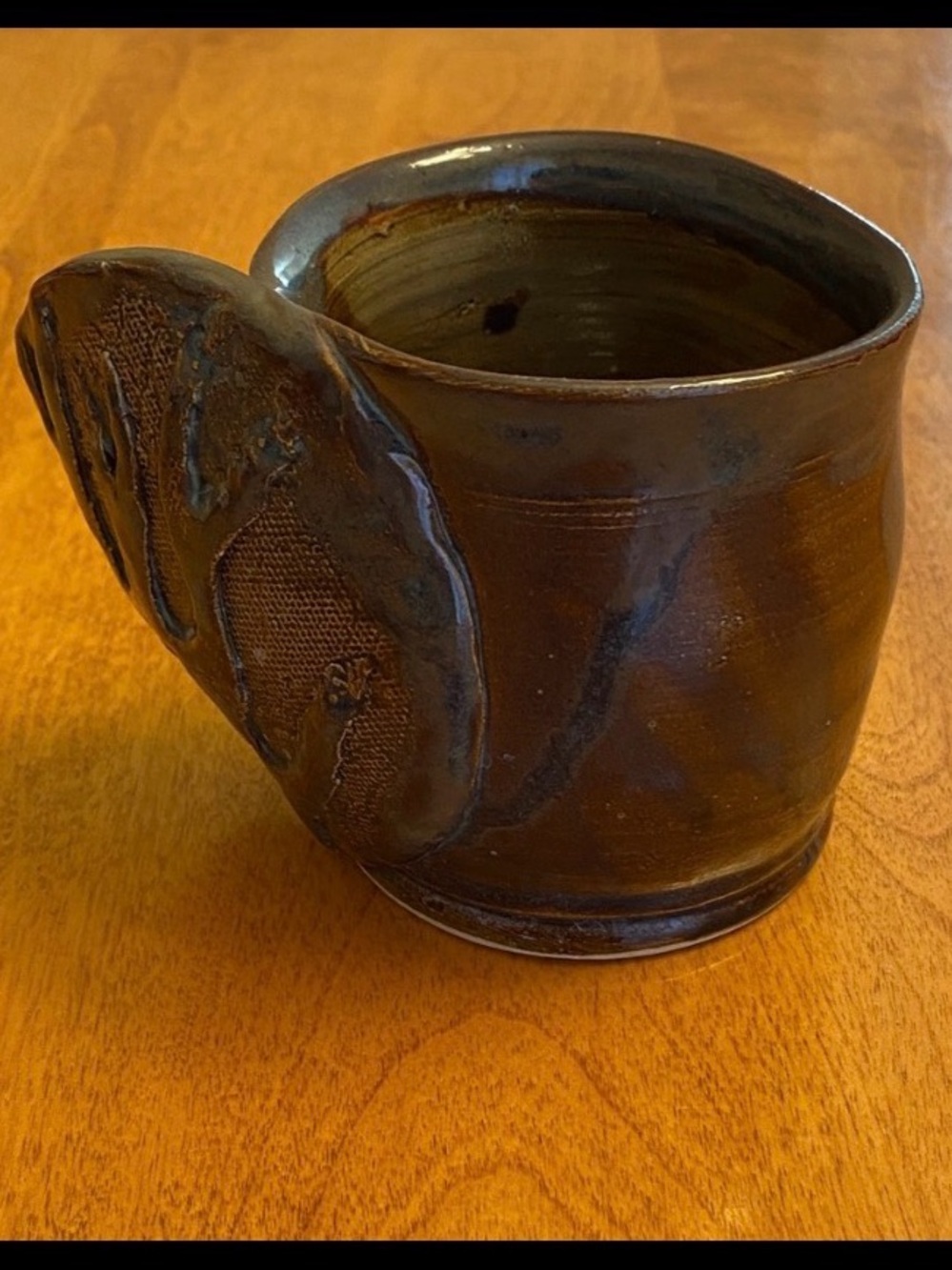 Handmade Brown Glazed Ceramic Mug with creative handle.